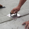 Picture of 10" x 6" 1-1/2"R Elite Series Five Star™ Stainless Steel Highway Edger with Cork Handle